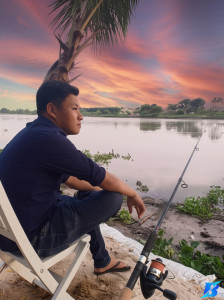 Người đàn ông bên bờ sông